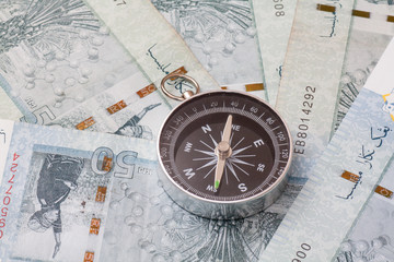 Finance concept:Compass on Malaysian Ringgit notes