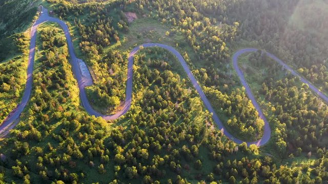 Aerial view of winding road on mountain in Autumn