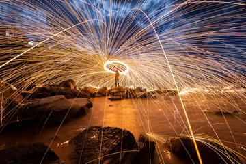 Spinning fireworks on the beach