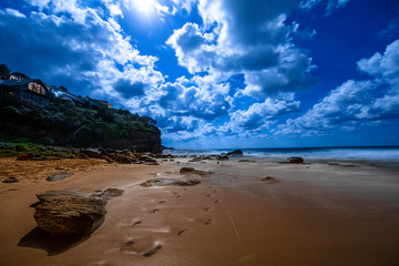 Sydney beach sunset with rock pools