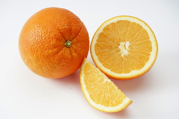 Ripe orange isolated on a light background. Selective focus