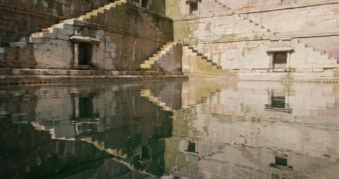 Water storage inside Toorji Ka Jhalra Baoli stepwell - one of water sources in Jodhpur, Rajasthan, India.