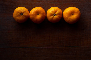 oranges on wooden table