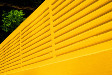 Yellow external wall of modern apartment.