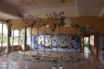 Abandoned Power Station with unsettling graffiti