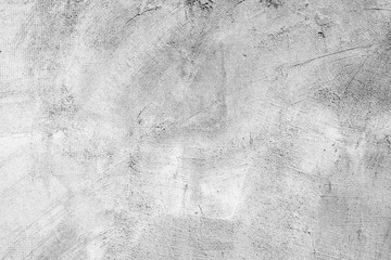 Fototapeta premium Texture of a concrete wall with cracks and scratches which can be used as a background