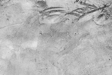 Texture of a concrete wall with cracks and scratches which can be used as a background
