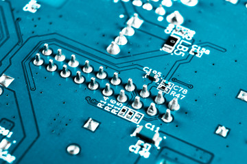 Macro shot of Circuit board with resistors microchips and electronic components. Computer hardware...