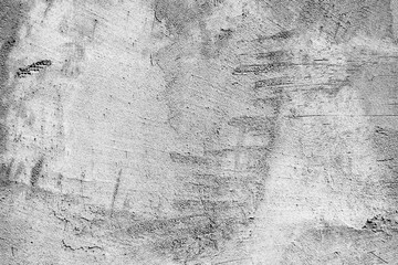 Texture of a concrete wall with cracks and scratches which can be used as a background