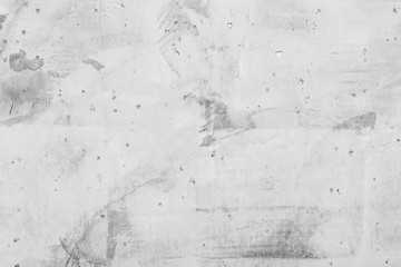 Texture of a concrete wall with cracks and scratches which can be used as a background