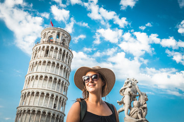 Tourist woman or girl in pisa tower, Italy