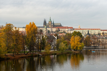 River Vltava and castle of Prague on a sunny day in autumn