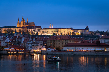 River Vltava and castle of Prague in the evening in autumn