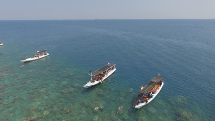 Fototapeta premium Three Boat on the sea view from top