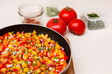 Mixed vegetables on a frying pan.