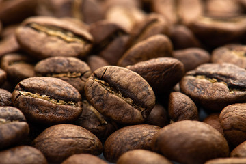 Coffee beans close-up background. Fresh roasted