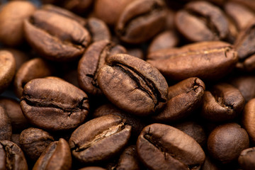 Coffee beans close-up background. Fresh roasted