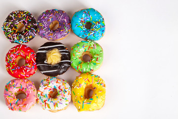colorful doughnuts white background studio