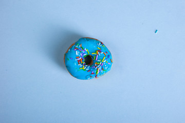 colorful doughnut blue background studio