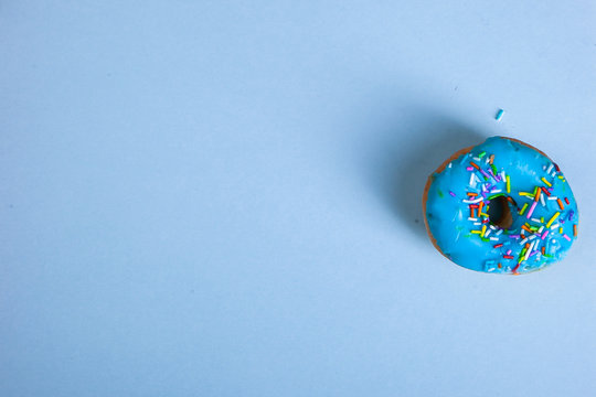 colorful doughnut blue background studio