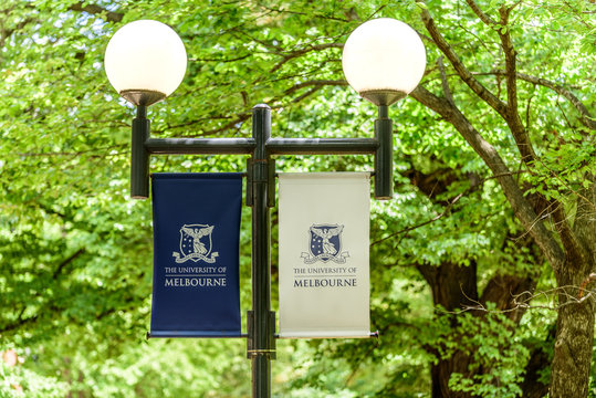 Melbourne, Victoria, Australia, January 12th, 2019: A dual headed lamp post with banners for 'The University Of Melbourne'