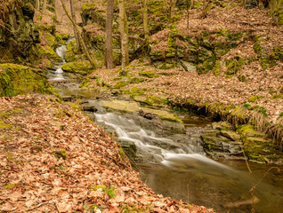 waterfalls and cascades on creek in autumn