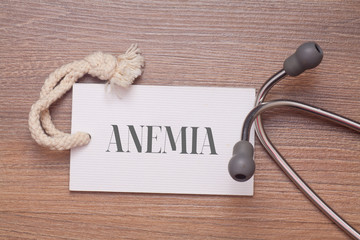 Medical Concept : The words anemia written on price tag label with Stethoscope
