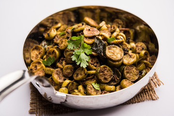 Tendli / Kundroo sabzi or Kovakkai Poriyal also known as ivy gourd, served in a bowl or karahi. selective focus