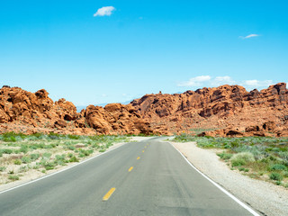 Road view Valley of Fire HIghway with desert scenery in Valley of FIre State Park, Nevada, near Las Vegas, sunny spring day, USA