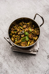 Tendli / Kundroo sabzi or Kovakkai Poriyal also known as ivy gourd, served in a bowl or karahi. selective focus