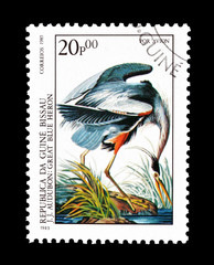 Cancelled postage stamp printed by Guinea Bissau, that shows Great Blue Heron, circa 1985.