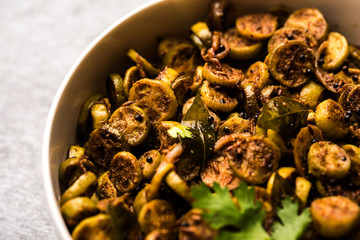 Tendli / Kundroo sabzi or Kovakkai Poriyal also known as ivy gourd, served in a bowl or karahi. selective focus