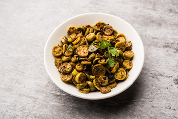 Tendli / Kundroo sabzi or Kovakkai Poriyal also known as ivy gourd, served in a bowl or karahi. selective focus