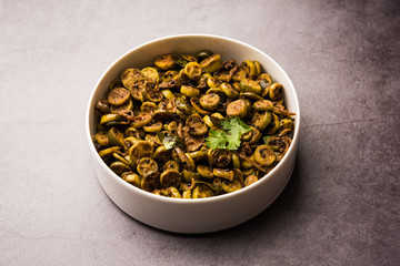 Tendli / Kundroo sabzi or Kovakkai Poriyal also known as ivy gourd, served in a bowl or karahi. selective focus