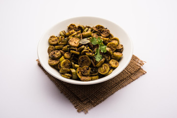 Tendli / Kundroo sabzi or Kovakkai Poriyal also known as ivy gourd, served in a bowl or karahi. selective focus