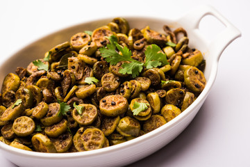 Tendli / Kundroo sabzi or Kovakkai Poriyal also known as ivy gourd, served in a bowl or karahi. selective focus