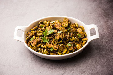 Tendli / Kundroo sabzi or Kovakkai Poriyal also known as ivy gourd, served in a bowl or karahi. selective focus