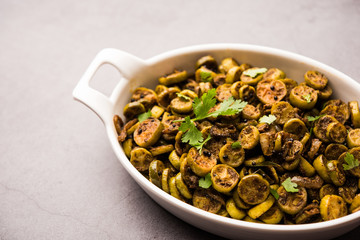 Tendli / Kundroo sabzi or Kovakkai Poriyal also known as ivy gourd, served in a bowl or karahi. selective focus