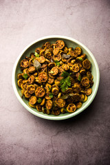 Tendli / Kundroo sabzi or Kovakkai Poriyal also known as ivy gourd, served in a bowl or karahi. selective focus