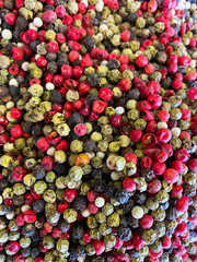 Background of red, white, black and green peppers. Turkish spices.