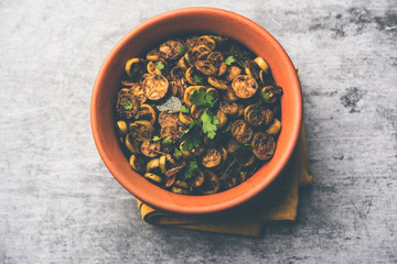 Tendli / Kundroo sabzi or Kovakkai Poriyal also known as ivy gourd, served in a bowl or karahi. selective focus