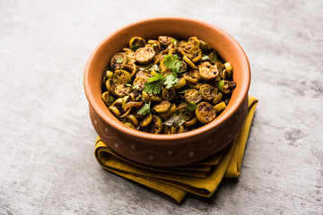 Tendli / Kundroo sabzi or Kovakkai Poriyal also known as ivy gourd, served in a bowl or karahi. selective focus