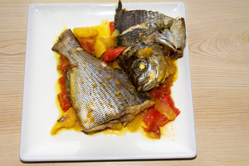 Baked fish with potatoes and red peppers