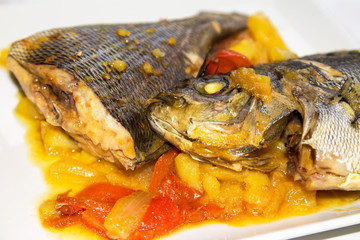 Baked fish with potatoes and red peppers