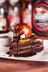 Soft chocolate cake and a scoop of vanilla ice cream