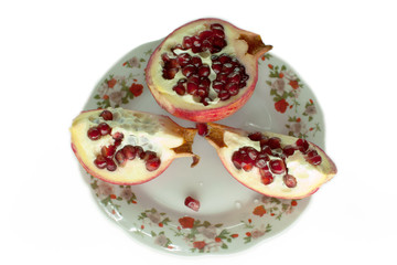 garnet on a plate on a white isolated background