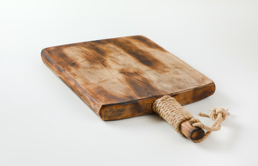 Rustic wooden cutting board or serving tray