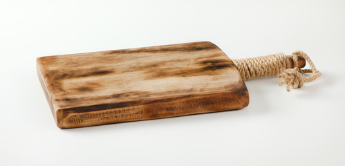 Rustic wooden cutting board or serving tray