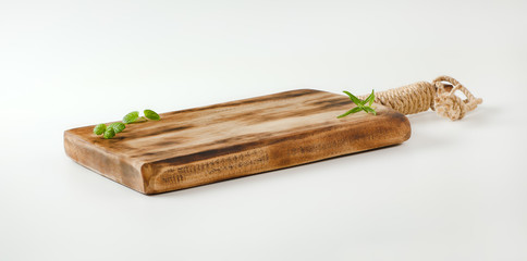 Rustic wooden cutting board or serving tray