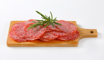 Thinly sliced salami sausage